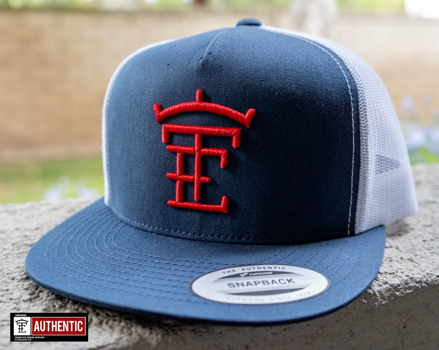 Blue and Red Tradicion Brand Hat
