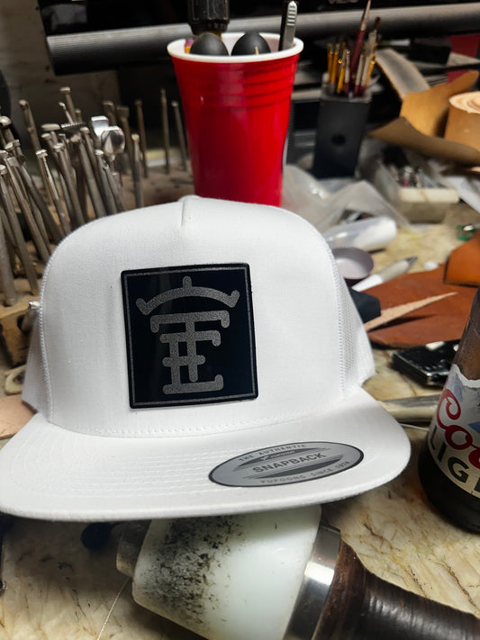 TE White Hat Ceramic Logo